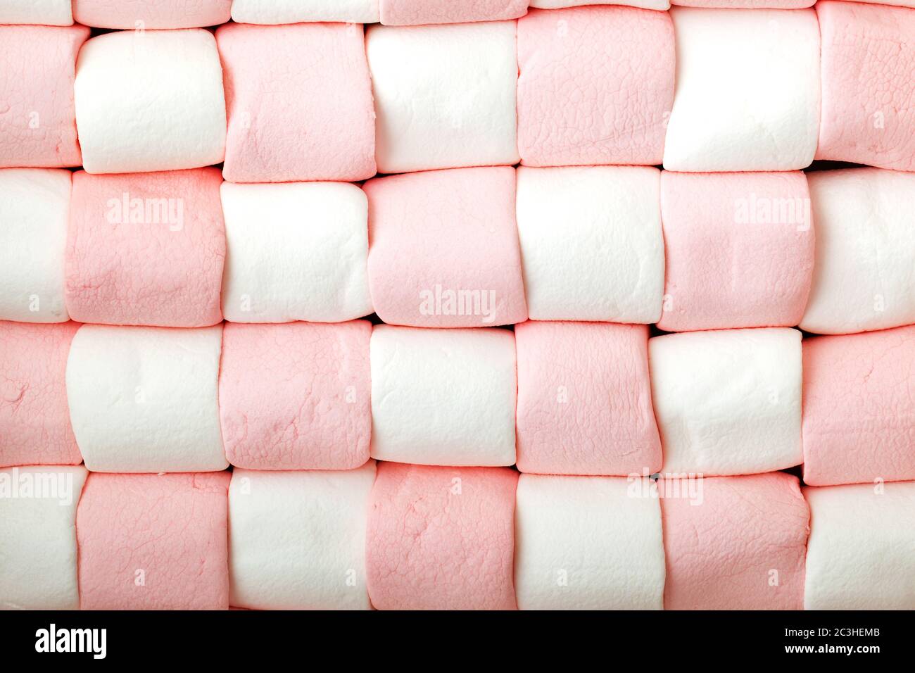 Marshmallow background in checkerboard formation Stock Photo - Alamy