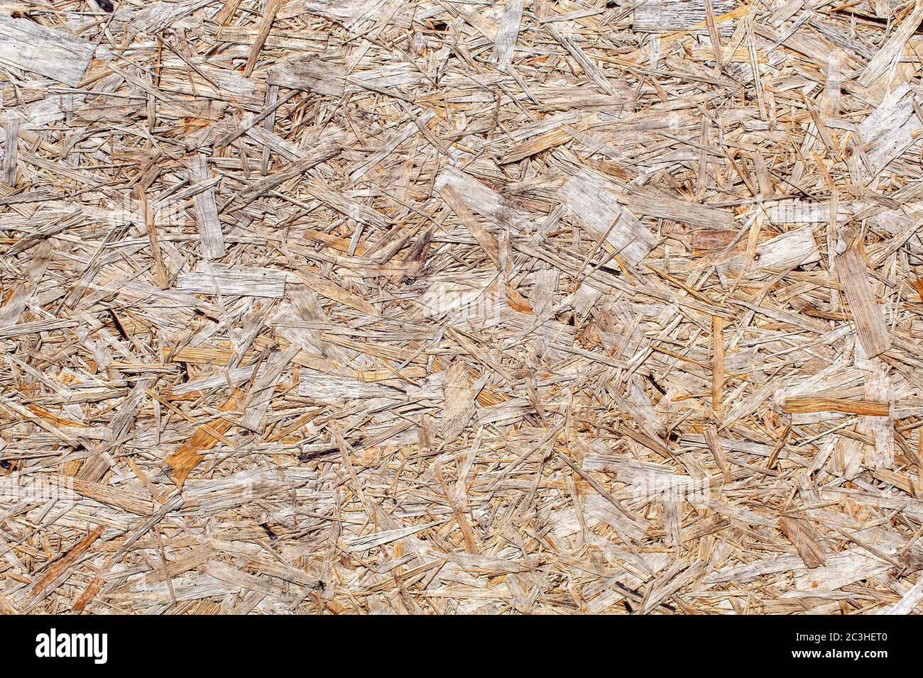 brown pressed chip panel closeup. abstract background Stock Photo