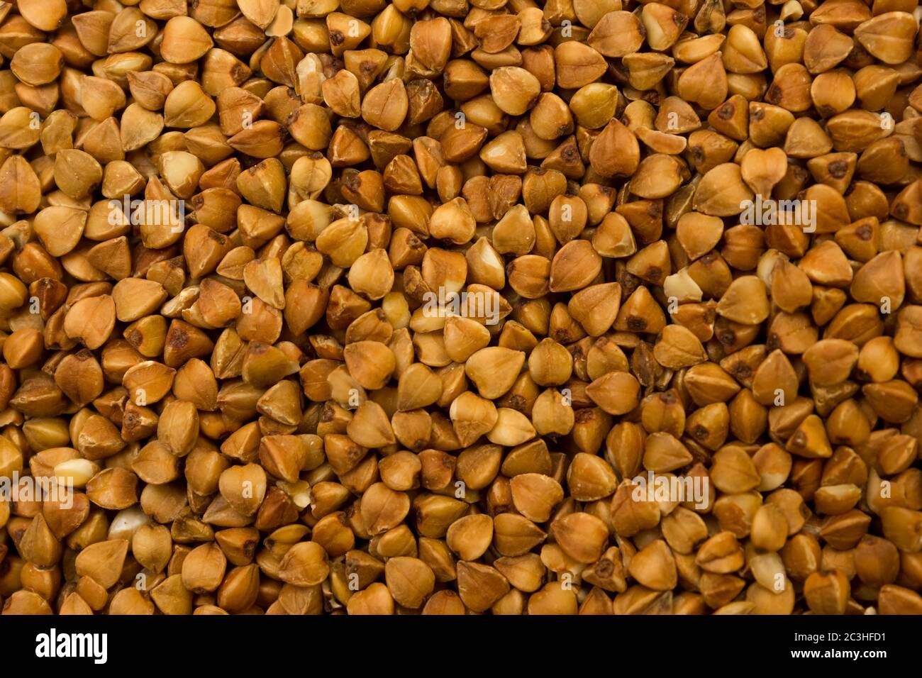 Dry buckwheat grains brown texture, food Stock Photo Alamy