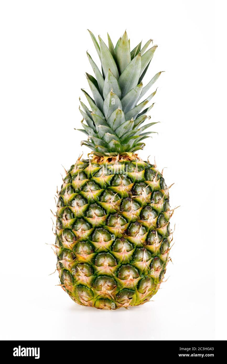 Fresh whole pineapple against white background Stock Photo