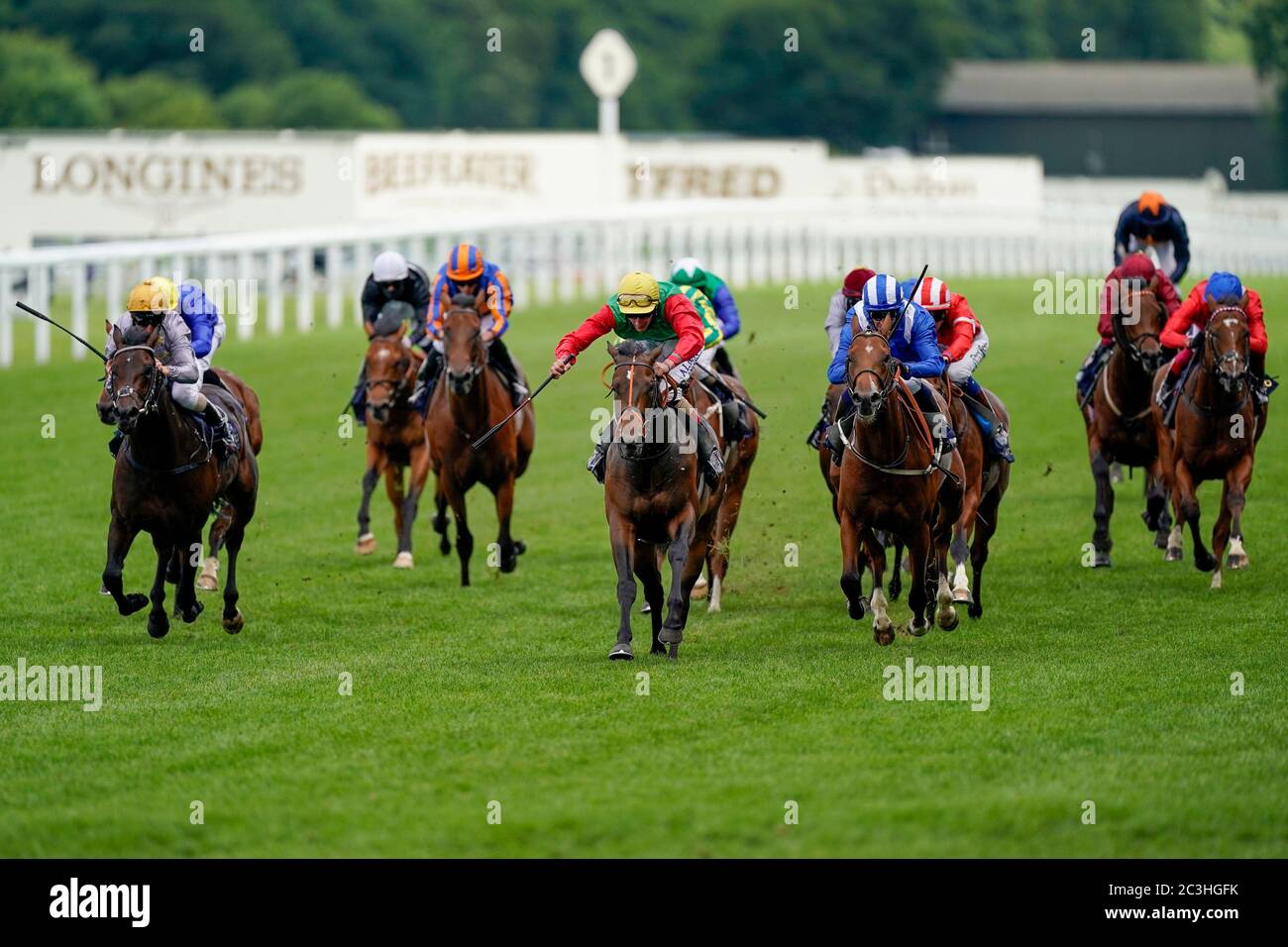 Nando Parrado ridden by Adam Kirby (centre) wins the Coventry Stakes during day five of Royal Ascot at Ascot Racecourse. Stock Photo