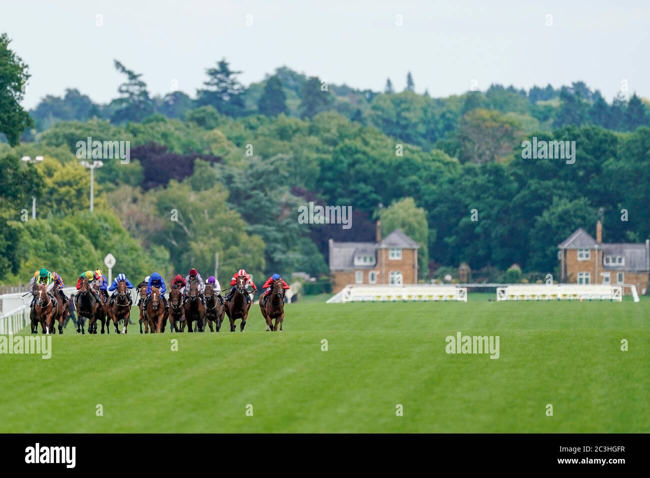 A general view as runners make their way down the track in The Coventry Stakes during day five of Royal Ascot at Ascot Racecourse. Stock Photo