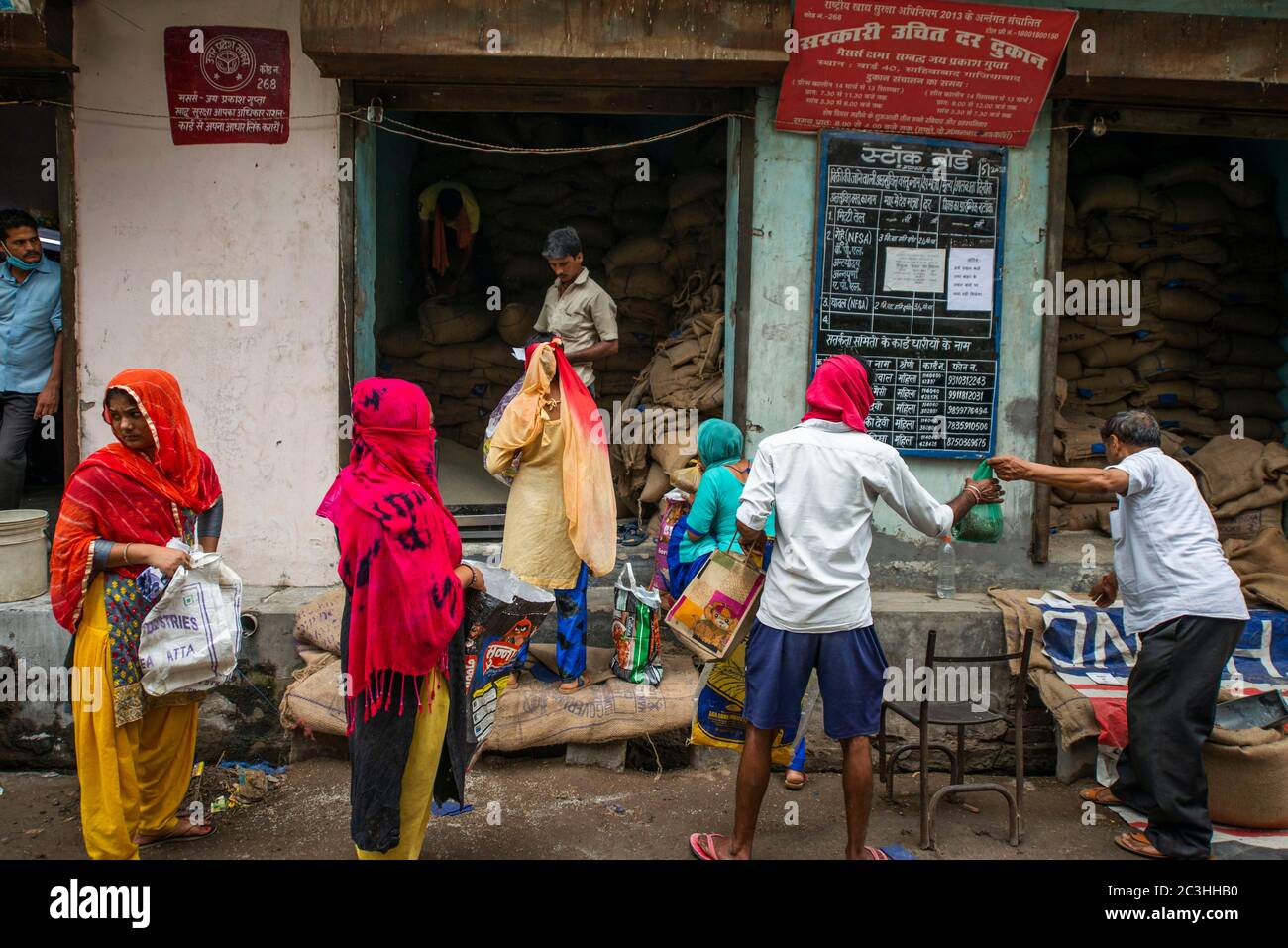 People gathered to collect free ration infront of ration shop