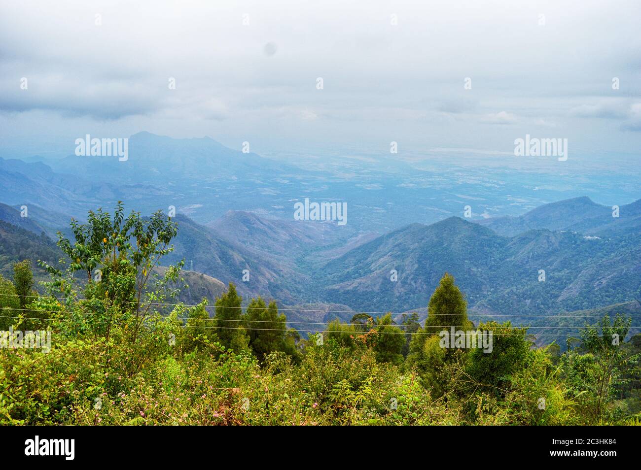 View of misty mountain from the cottage Stock Photo - Alamy