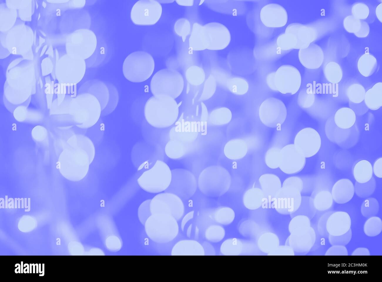 blue purple white blurred lights of diode garland, blurry full frame background Stock Photo