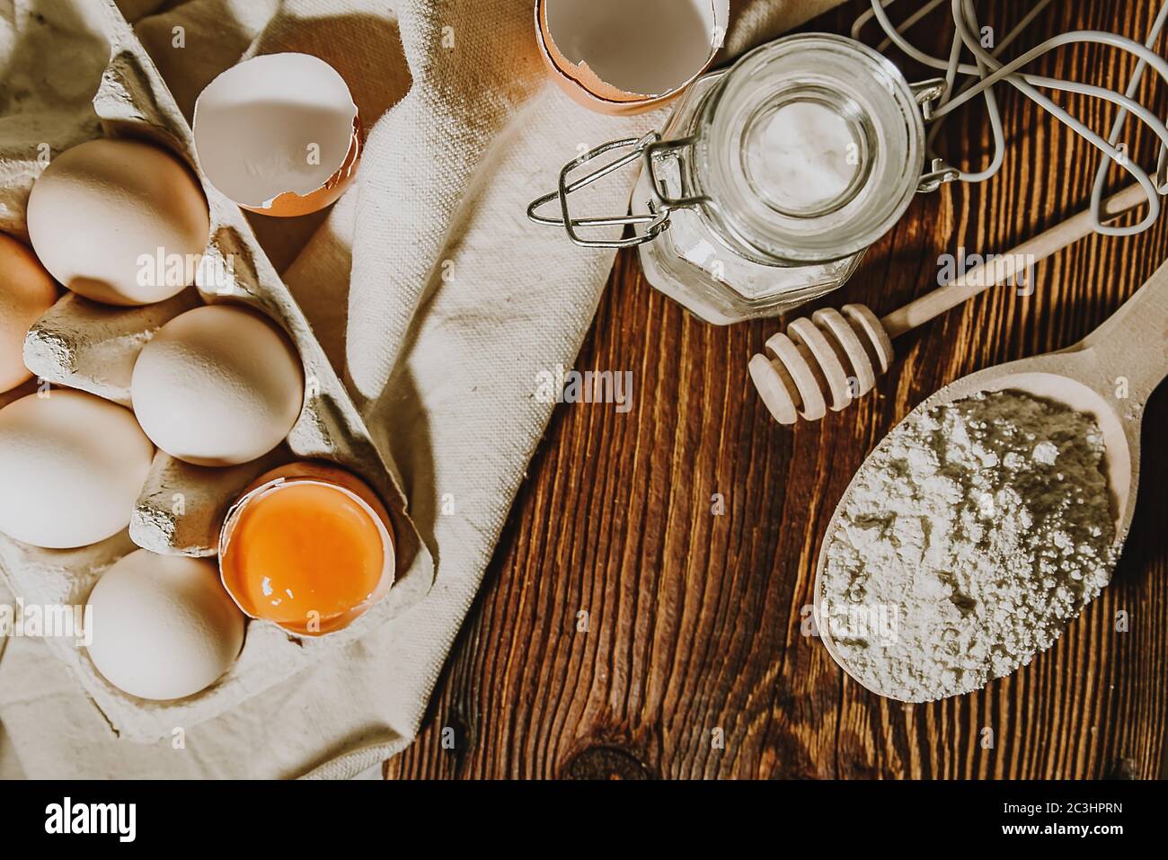 Baking ingredients with eggs, wheat flour, egg yolks for pastry. Cake