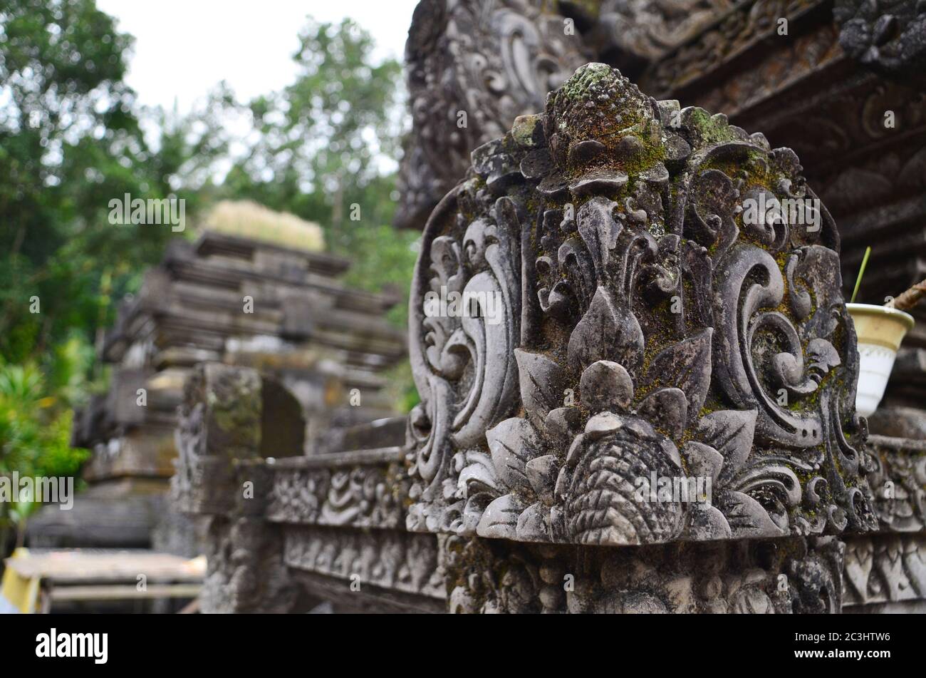 Ancient statue and carving in Hindu temple Pura Tirta Empul, Bali, Indonesia. Stock Photo