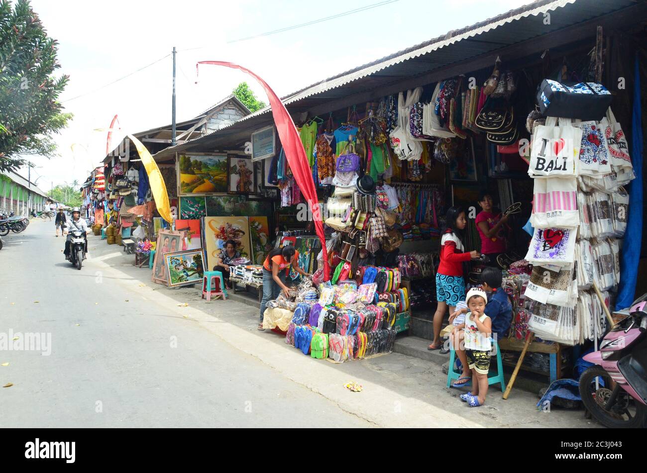 Busy shopping street at Kuta with the local produced products and souvenir. Stock Photo