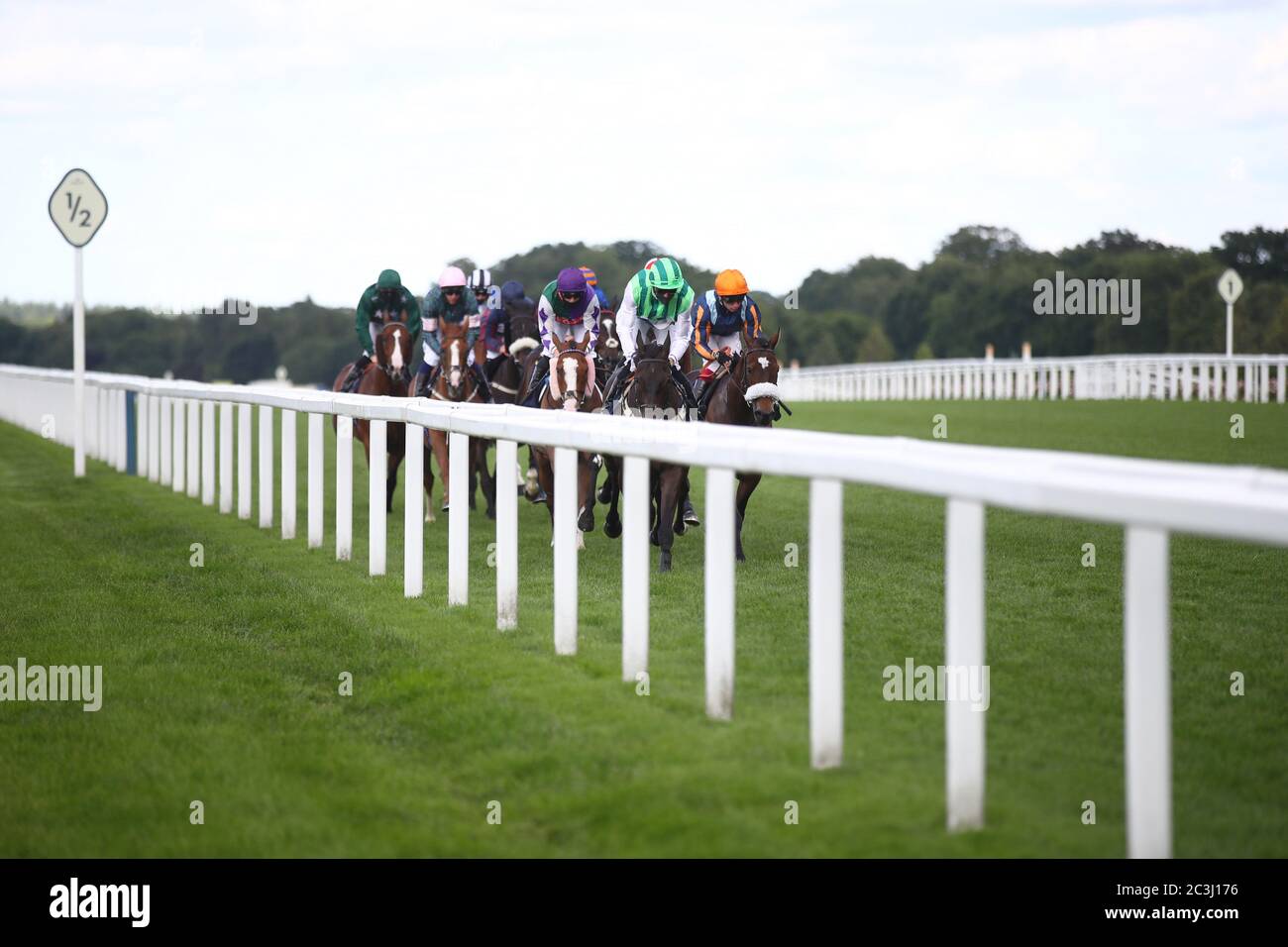 Adrrastos ridden by James Doyle leads the first lap of the Queen Alexandra Stakes during day five of Royal Ascot at Ascot Racecourse. Stock Photo