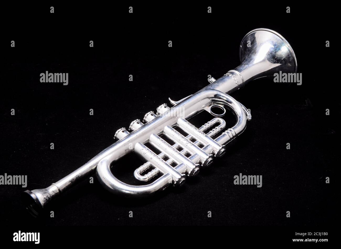 silver toy trumpet