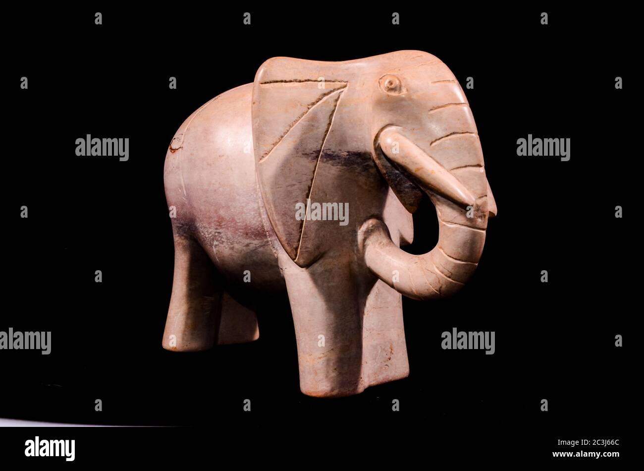 Marble Handmade Statue of an Elephant on Black Background Stock Photo ...