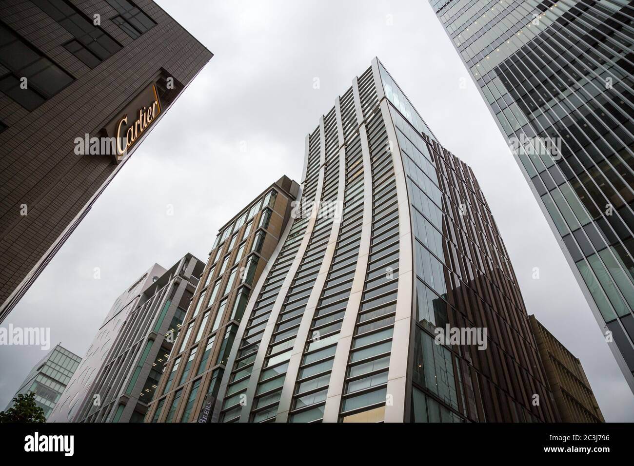 TOKYO, JAPAN - The Cartier and iconic De Beers buildings in the exclusive shopping district of Ginza.  24th June 2016: The Cartier and iconic De Beers Stock Photo