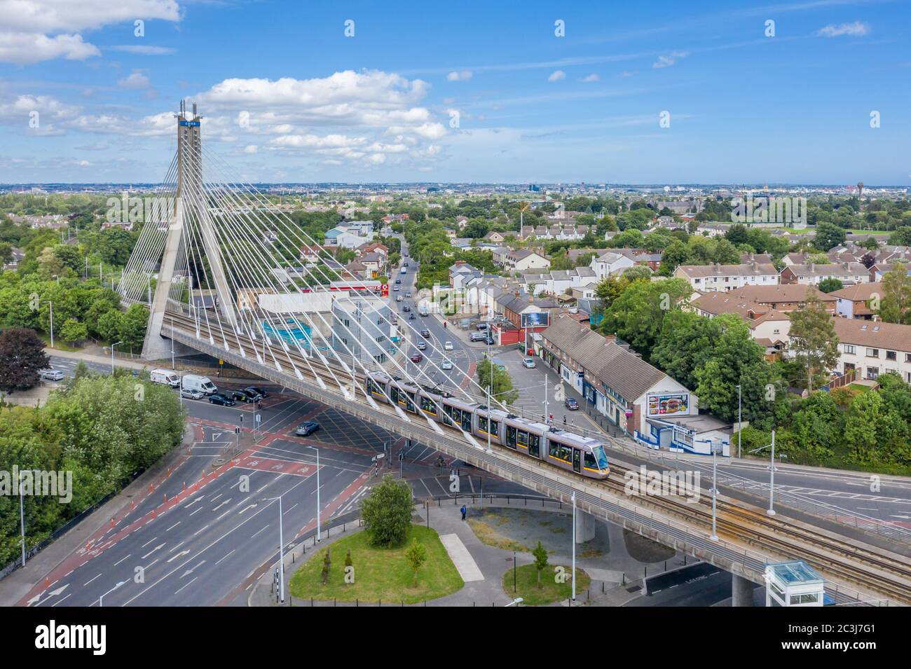 William Dargan Bridge is a cable-stayed bridge in Dundrum, Dublin in Ireland. It carries the LUAS light rail line across a busy road junction. Stock Photo