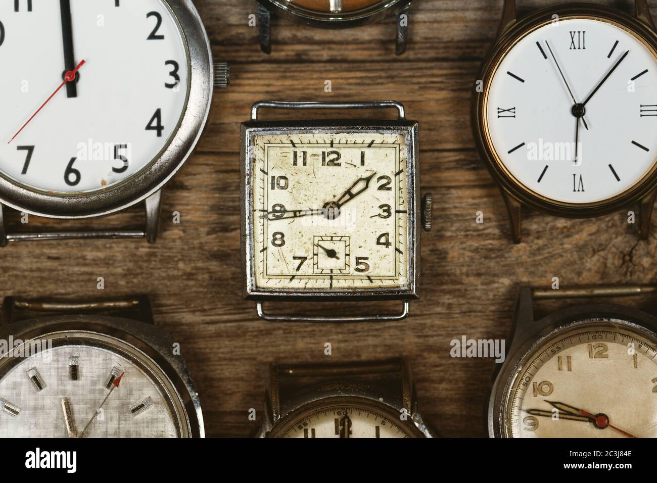 Watch Background Retro A selection of retro and antique watches over old wood background ...