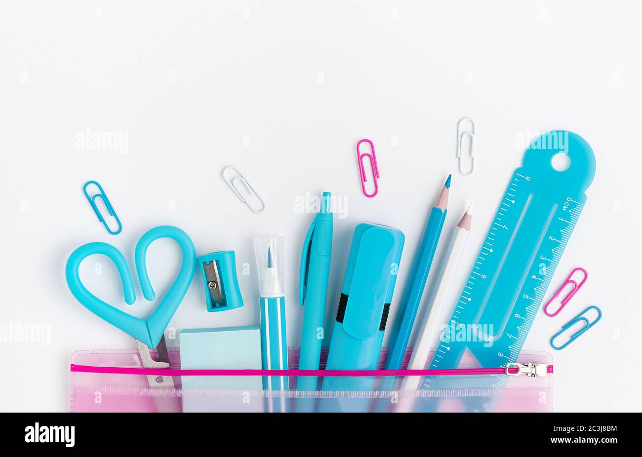 Cyan school supplies on white background. Copy space, directly above Stock Photo