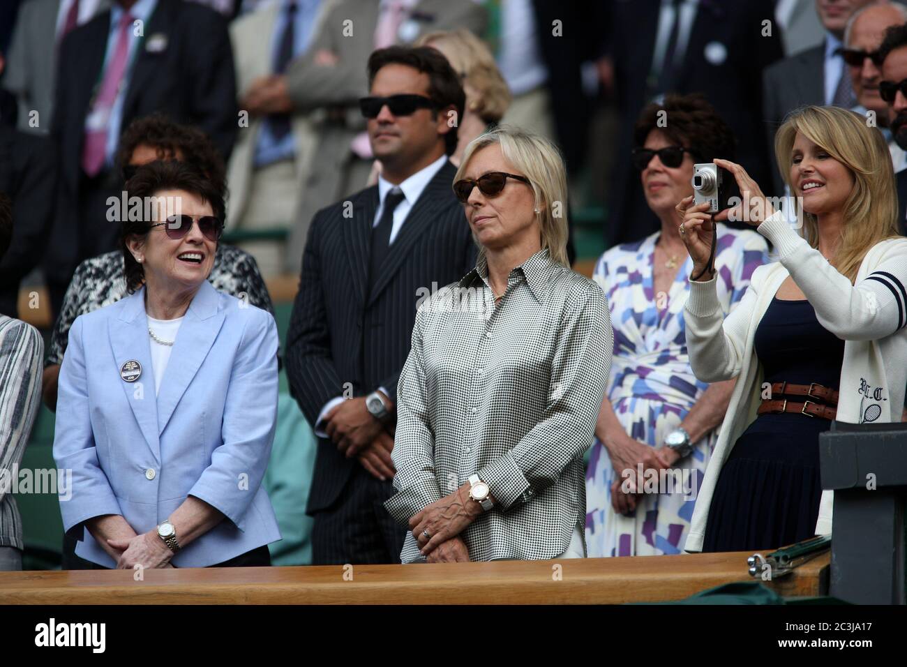 Christie Brinkley snaps a photo while standing alongside tennis greats Martina Navratilova and Billie Jean King after the 2010 women's final at Wimbledon which was won by Serena Williams. Stock Photo