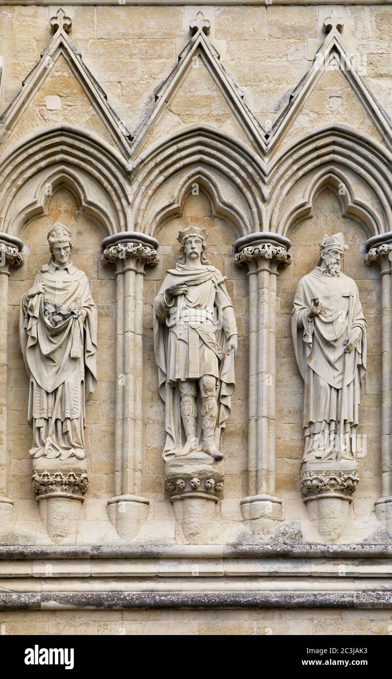 Statues of Saints on the exterior of Salisbury Cathedral, Wiltshire, UK. This Anglican Cathedral was built in the 13th Century, and these particular s Stock Photo