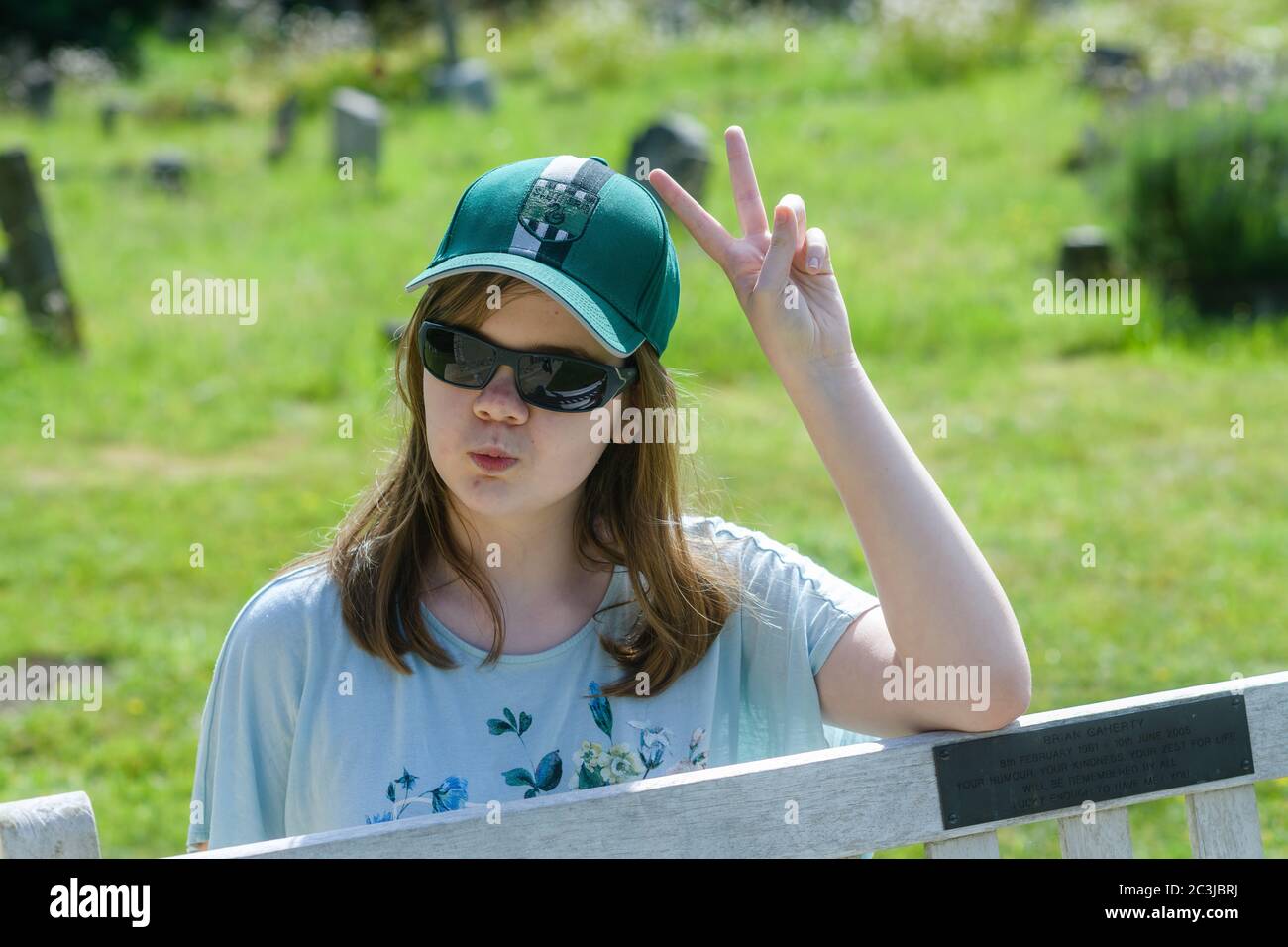 Girl wearing a baseball cap hi-res stock photography and images - Alamy
