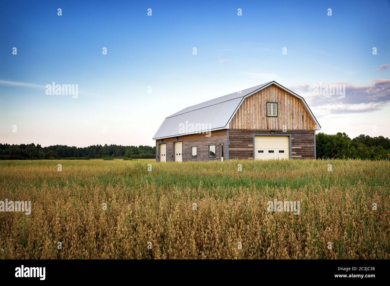 Wooden barn in Canadian countryside at dusk Stock Photo - Alamy
