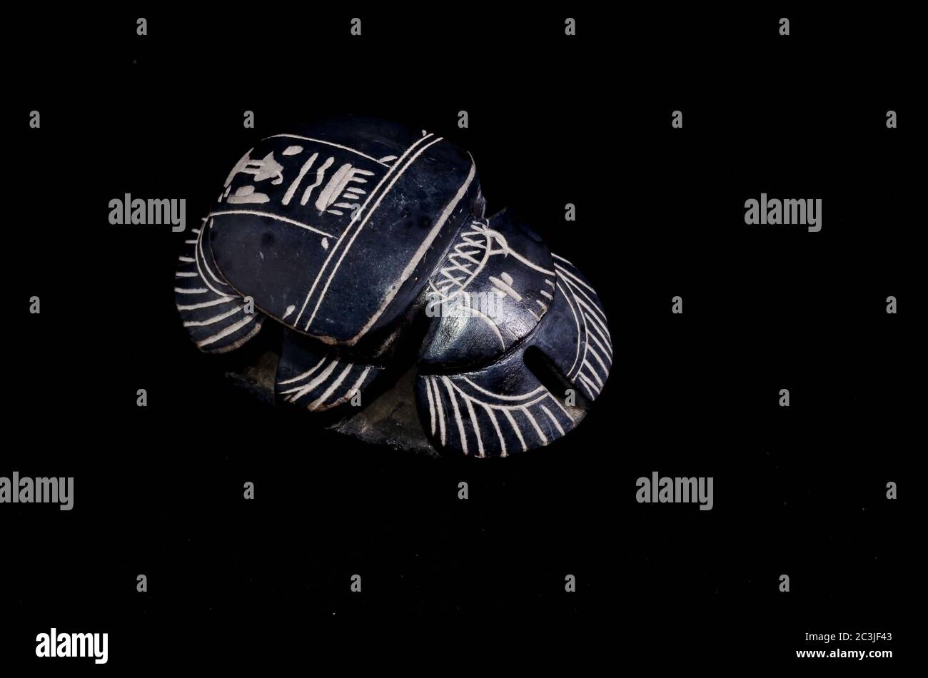 Stone Ritual Egyptian Scarab isolated on Black Background Stock Photo ...