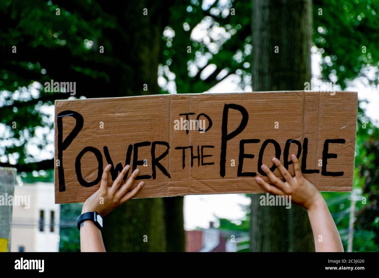 Black Lives Matter Protest George Floyd Juneteenth March - Power To The People Sign being held up in Teaneck, NJ Stock Photo