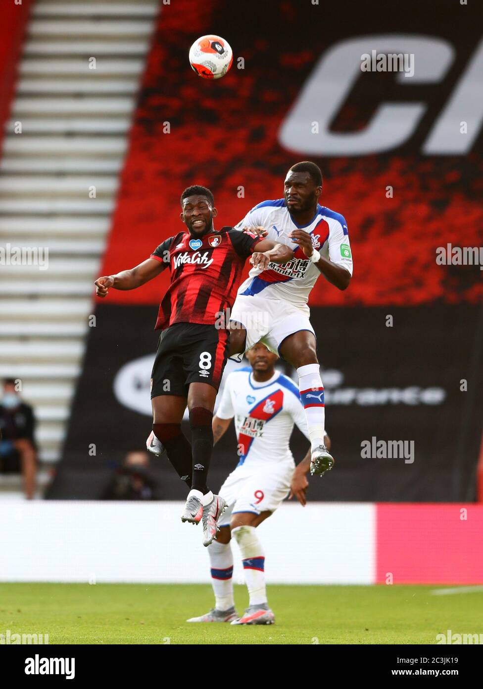 Bournemouth's Jefferson Lerma (left) battles for the ball with Crystal  Palace's Jordan Ayew and Christian Benteke (right) during the Premier  League match at the Vitality Stadium, Bournemouth Stock Photo - Alamy