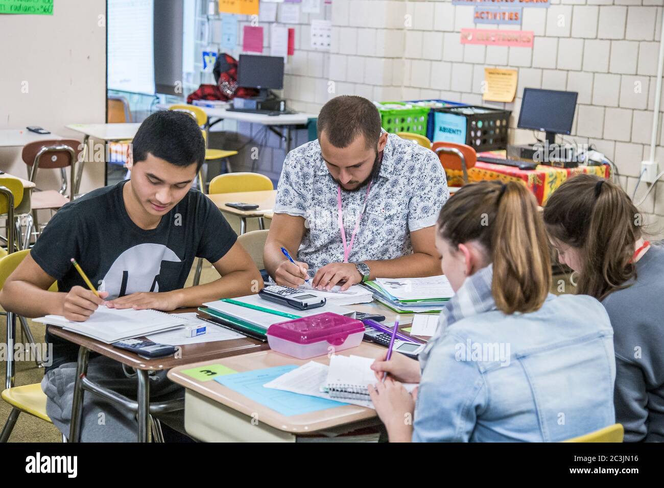 High school students working together in a classroom Stock Photo