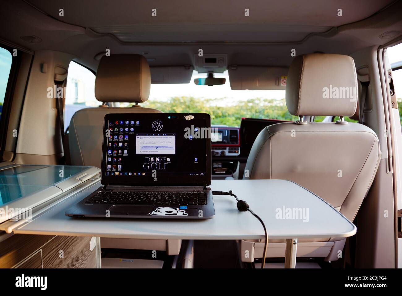 St. Petersburg, Russia - July 22, 2019: Interior of modern Volkswagen  Multivan California Ocean (Transporter T6). Working laptop on the table  inside a car Stock Photo - Alamy