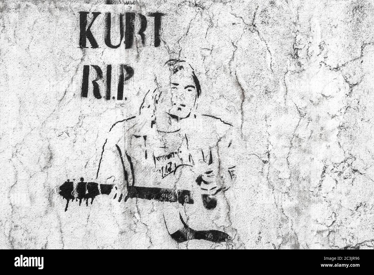 Kurt Cobain character. Graffiti / stencil on grungy wall. Bergamo, ITALY - May 20, 2019. Stock Photo