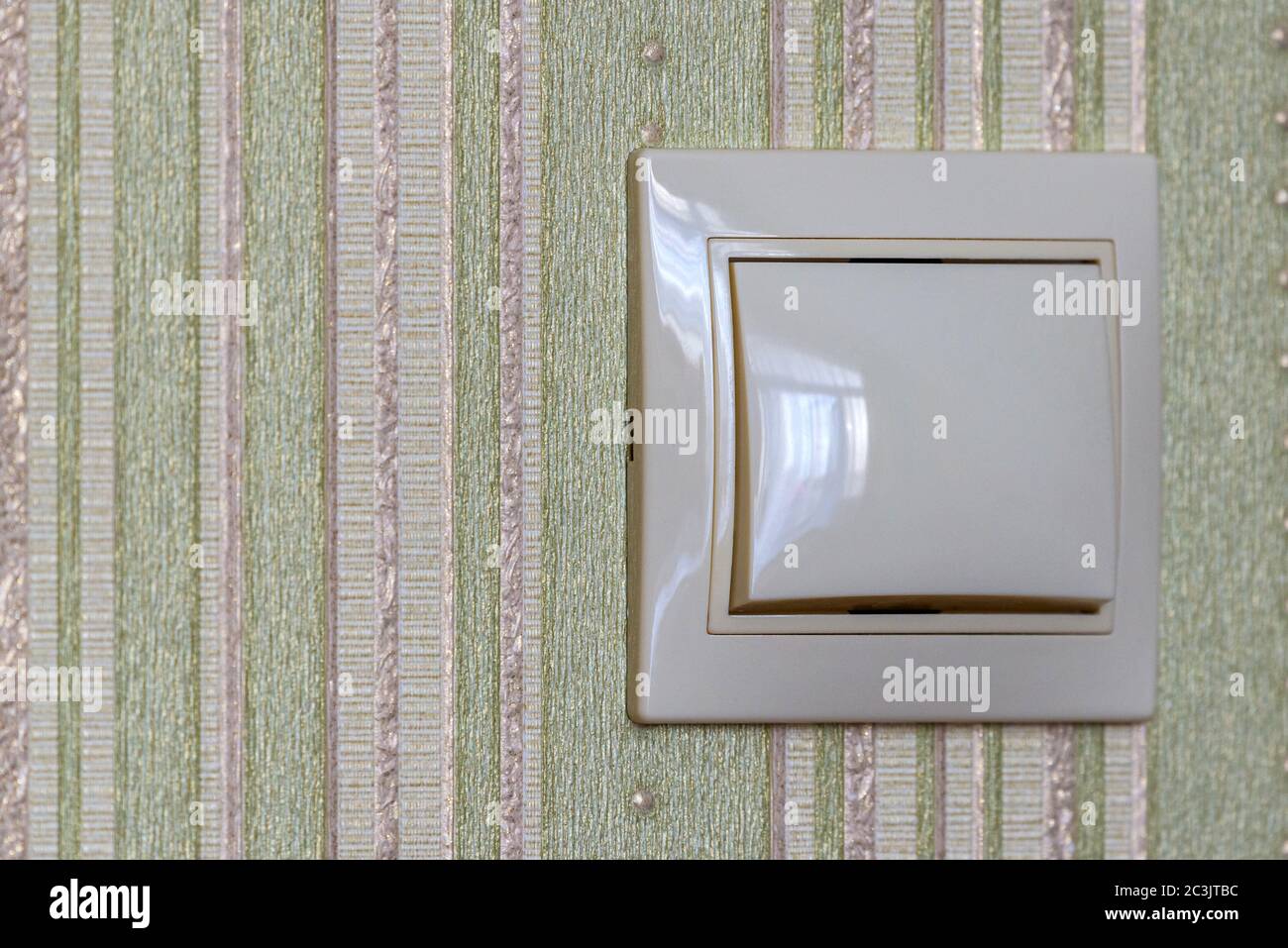 Plastic light switch, turn on or turn off the lights. Stock Photo