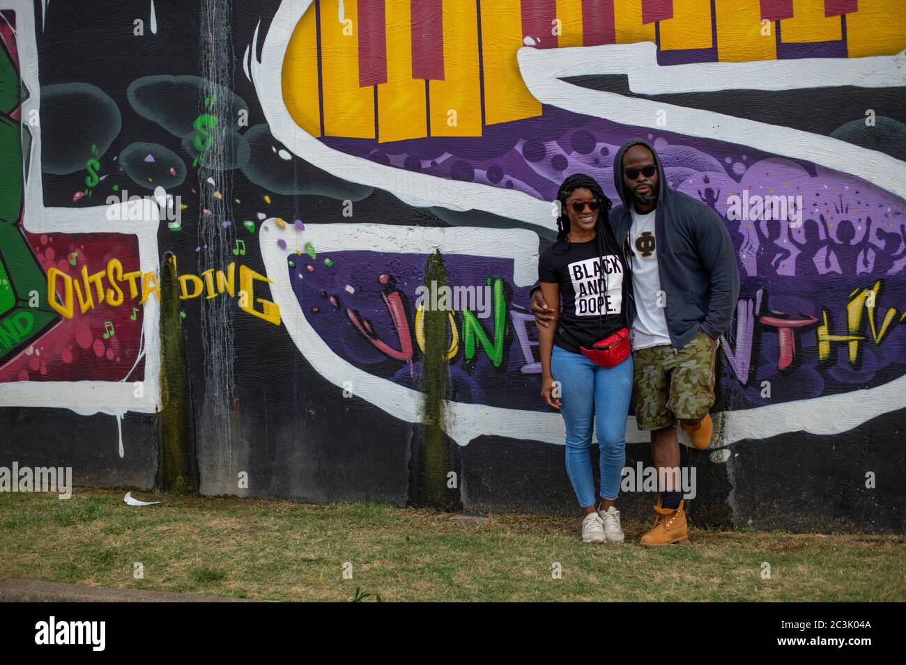 June 19 2020 Tulsa Oklahoma Usa Attendees Of The Annual Juneteenth Celebration Stand For A Picture In Front Of The Black Wall Street Mural On Friday People Attended The Juneteenth Celebration In