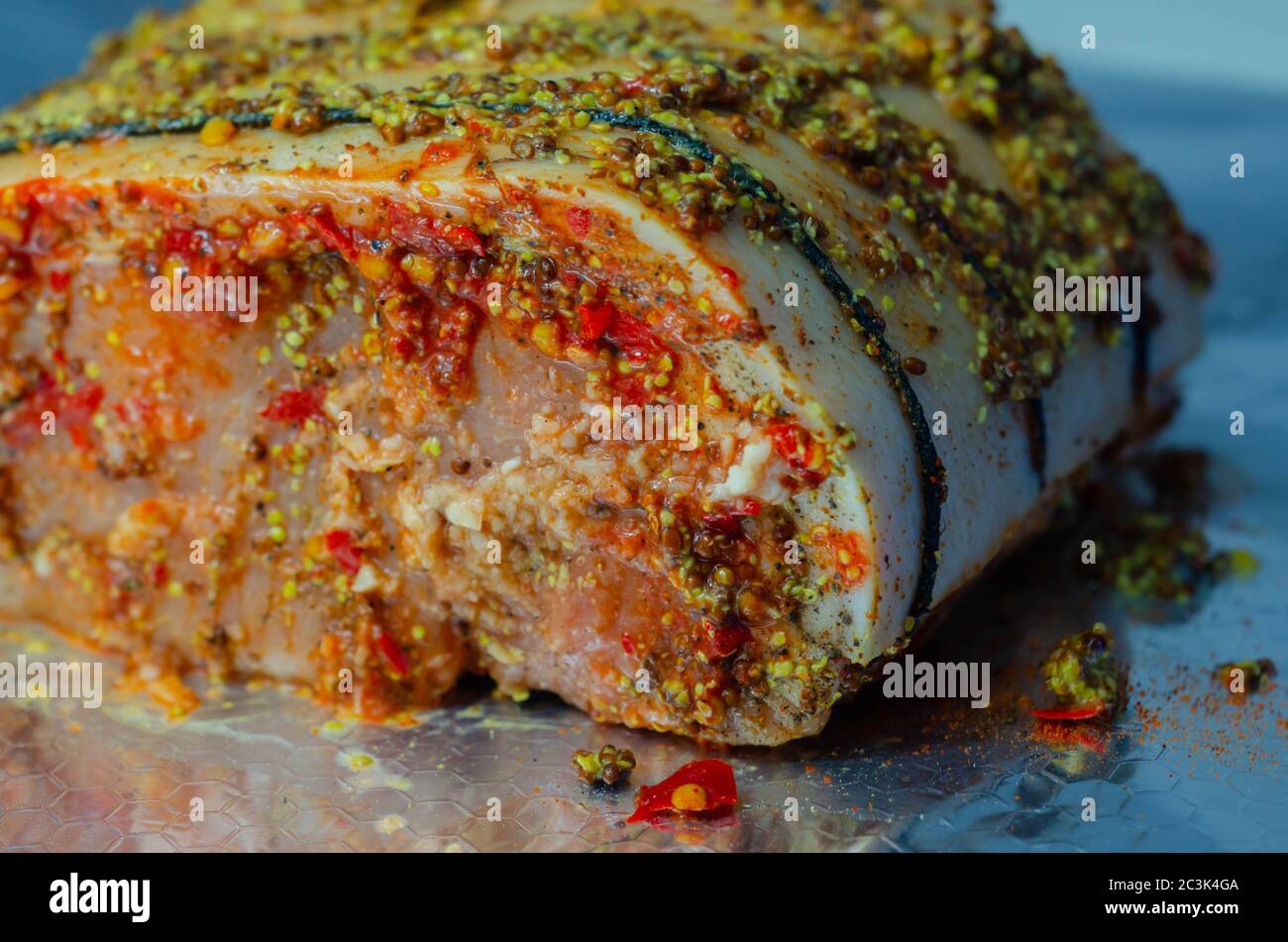 Boneless British rindon pork loin joint, prepared in marinades