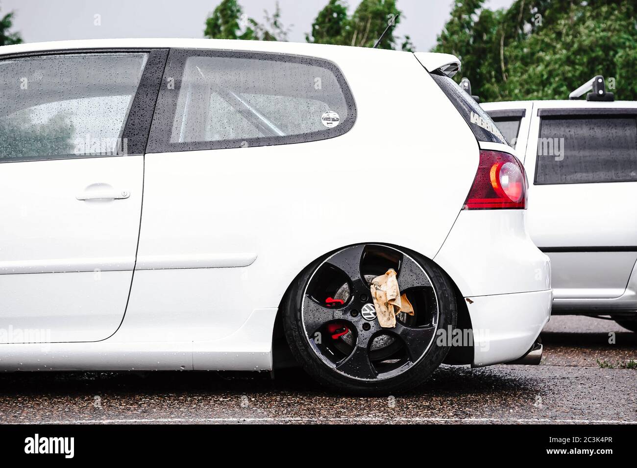 Moscow, Russia: July 06, 2019: Bright white volkswagen golf mk5 on a  parking. Tuned Lowered car with black forged wheels. With Rag for wiping  rims Stock Photo - Alamy