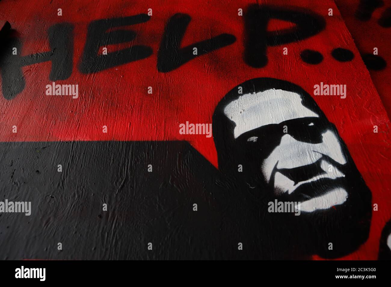 London, England - June 20: An artist depictsf the face of George Floyd along with text. Floyd was Killed in the US by former Minneapolis police office Stock Photo