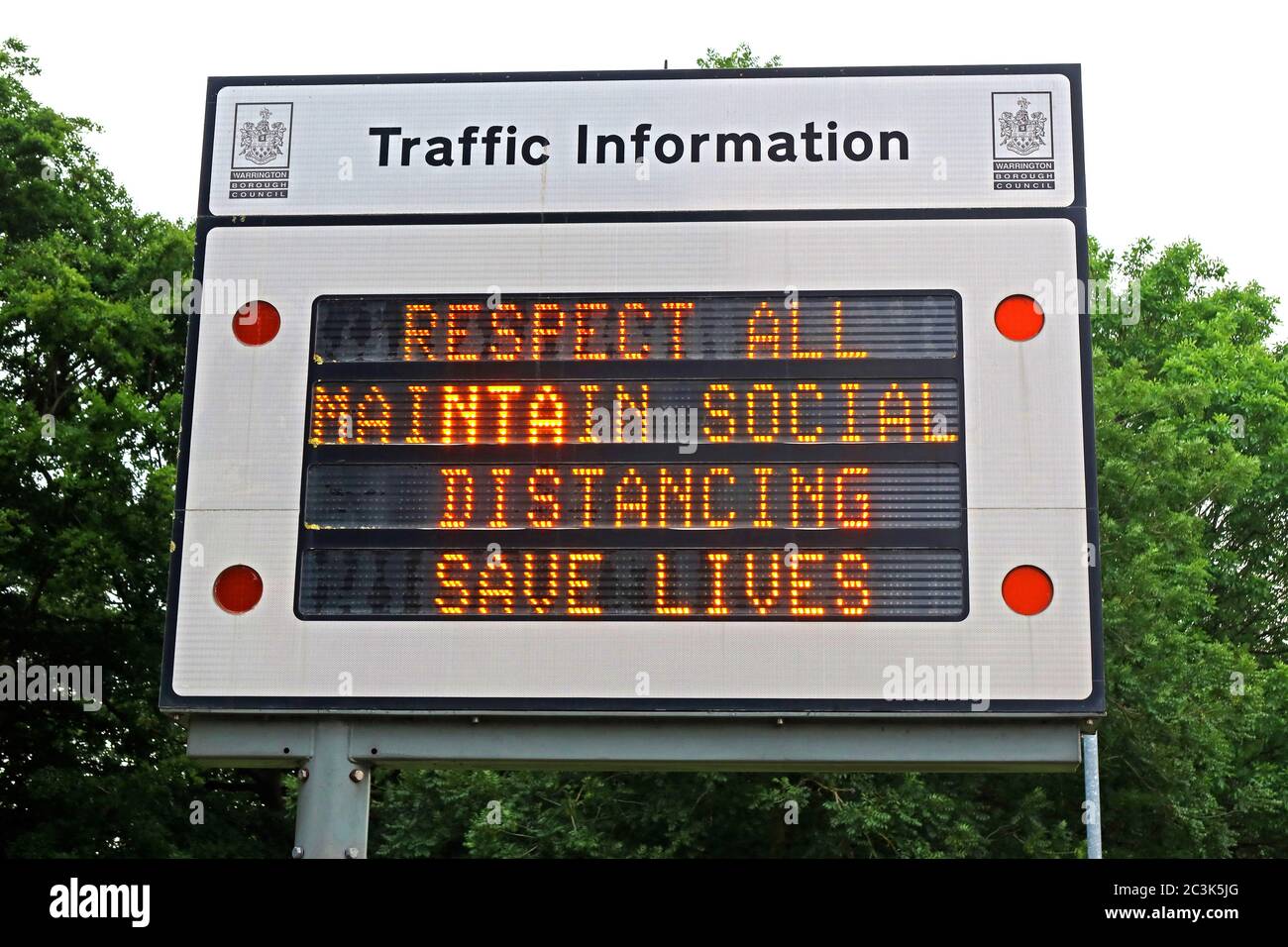 Traffic Information Sign,showing Respect All,maintain Social Distancing , save lives public information during Coronavirus,Covid19,Covid-19 Stock Photo