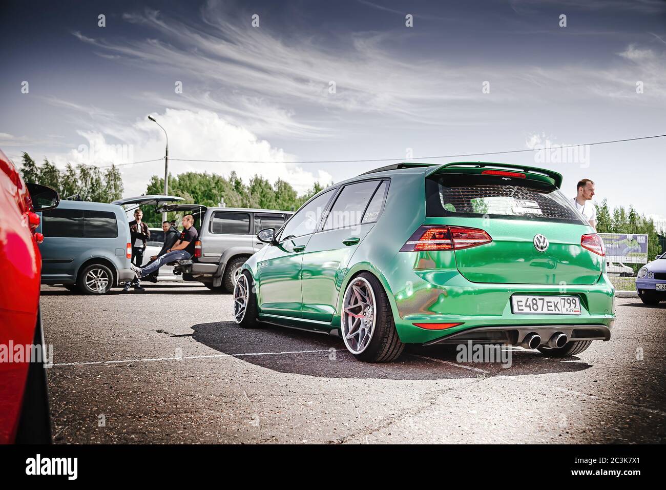 Moscow, Russia - July 06, 2019: Tuned Volkswagen Golf 7 tightened into a  green vinyl film. Installed exclusive wheels, air suspension. Lowrider in  the parking lot. Back side view Stock Photo - Alamy