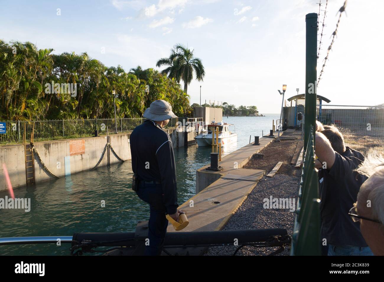 Cullen Bay Lock in operation as a boat comes into the marina in Darwin, Northern Territory, Australia Stock Photo