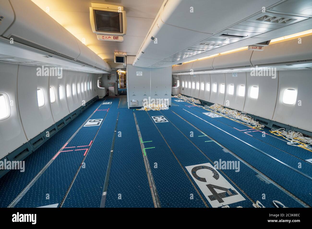 Interior view of a converted passenger into freighter plane with removed seats to fly surgical