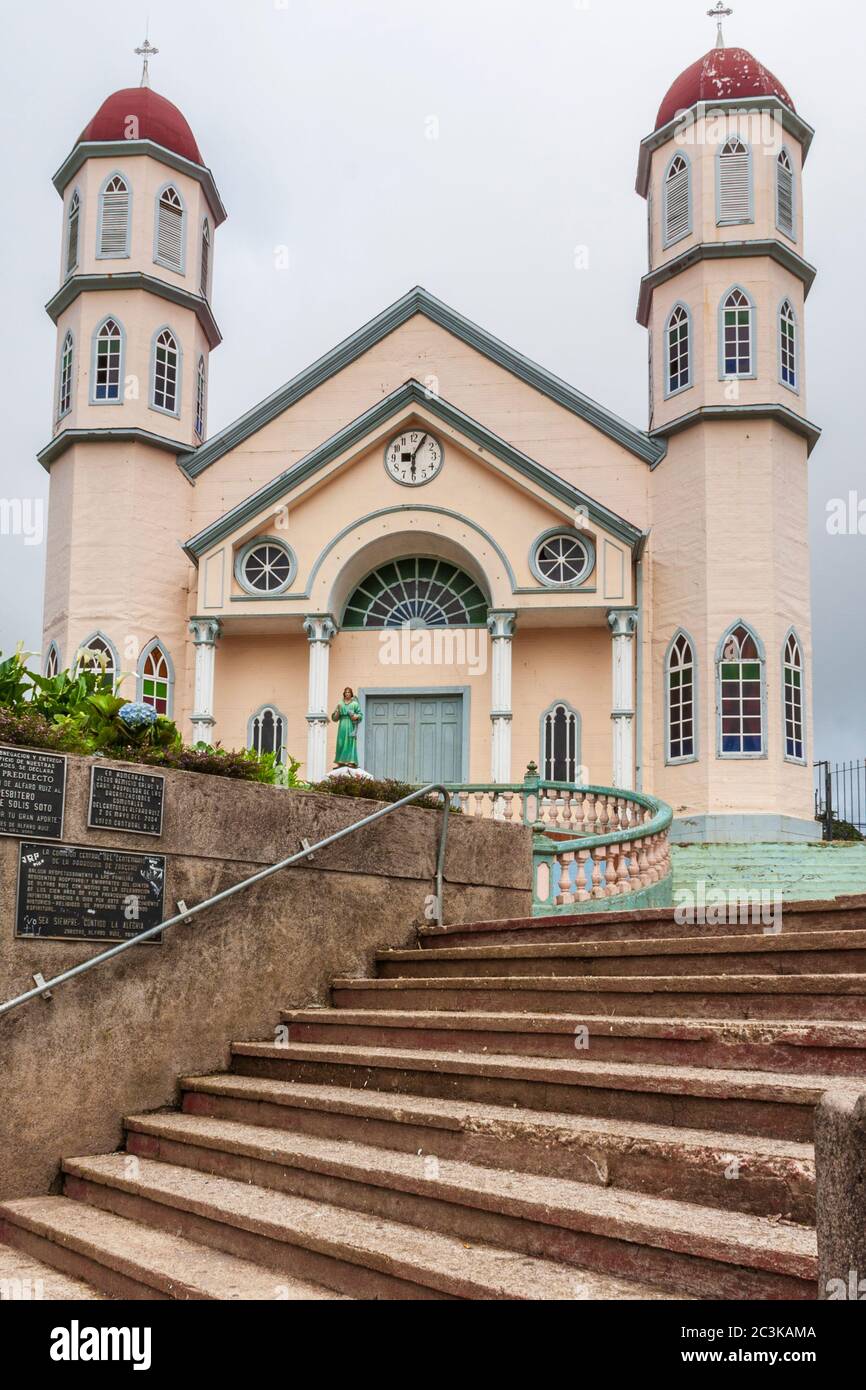 Iglesia de San Rafael Arcángel Catholic Church in Zarcero, Costa Rica. Church is made of wood but covered with tin to protect the very old structure. Stock Photo