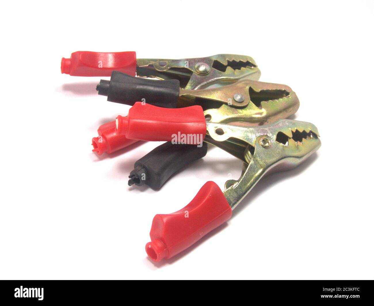 Closeup shot of black and red cable cutters under the lights isolated on a white background Stock Photo