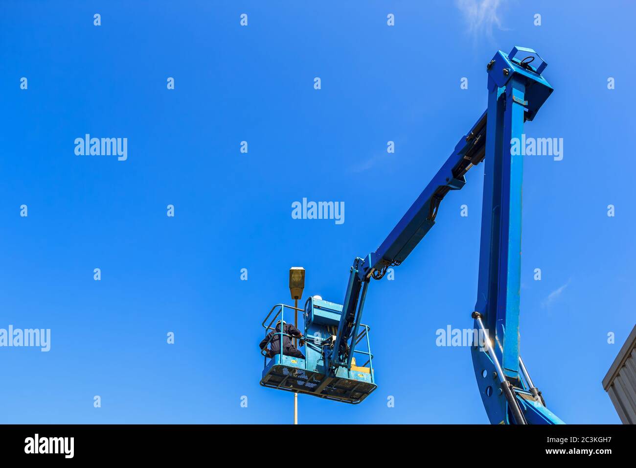 Boom lift bucket lift cherry picker hires stock photography and images