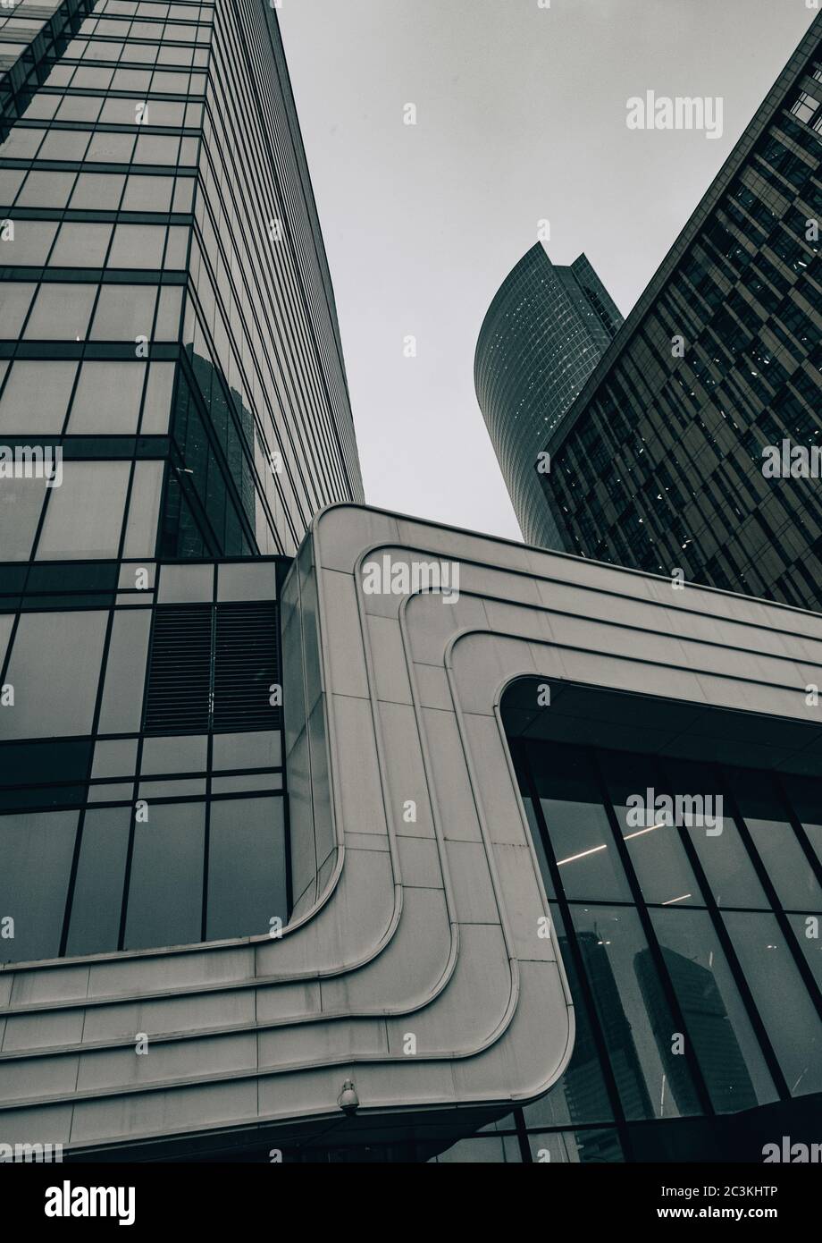 Low angle vertical shot of modern architectural buildings in a city ...