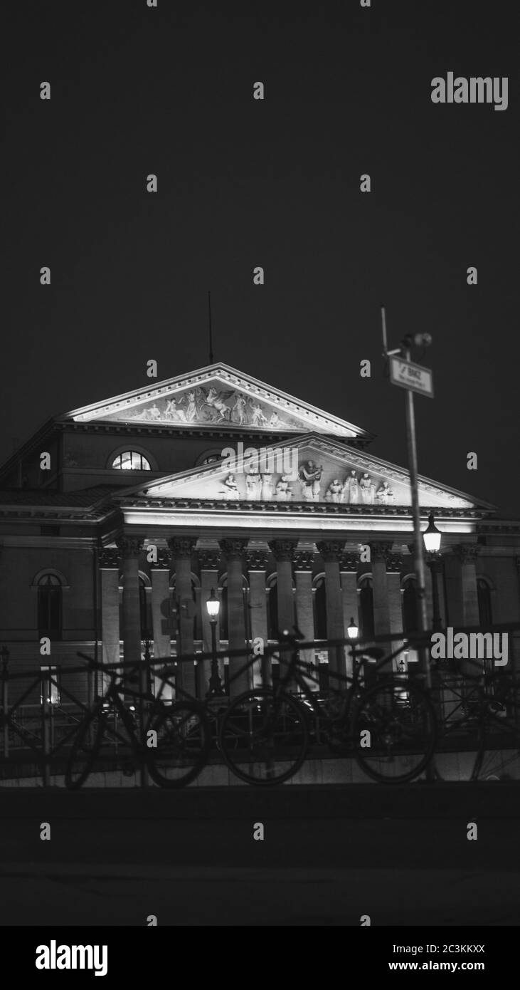 A vertical grayscale picture of Welser-Kuche in Munich, Germany A vertical grayscale picture of Welser-Kuche in Munich, Germany