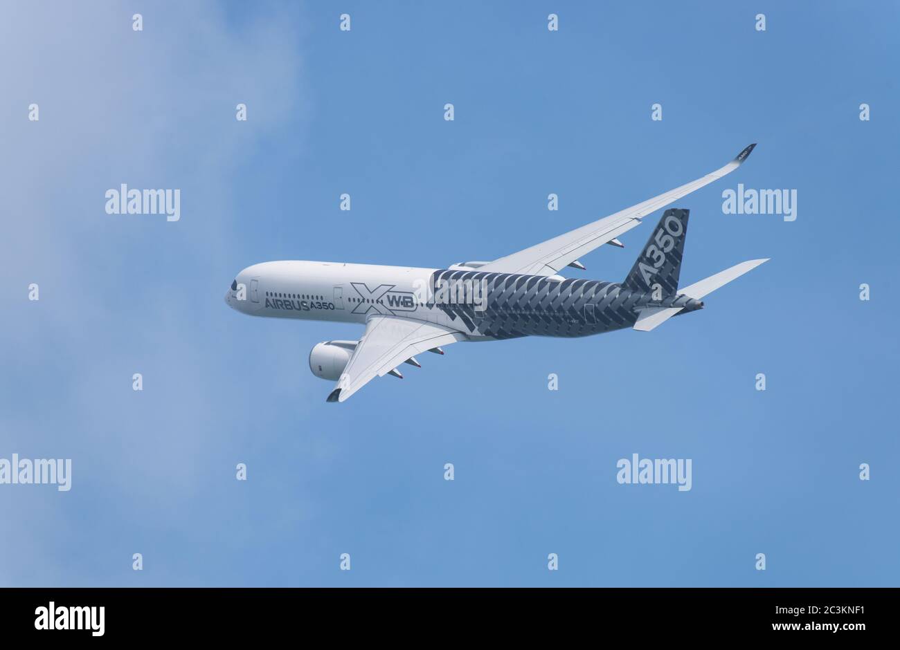 Singapore - February 14, 2016: Airbus A350 XWB during it’s performance at Singapore Airshow at Changi Exhibition Centre in Singapore. Stock Photo