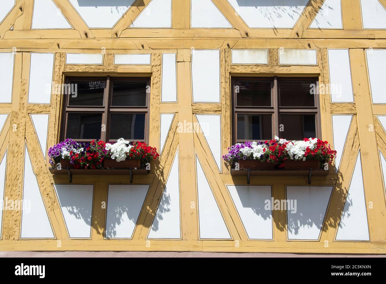 Window boxes on a half-timbered historic building in Nuremberg, Bavaria ...
