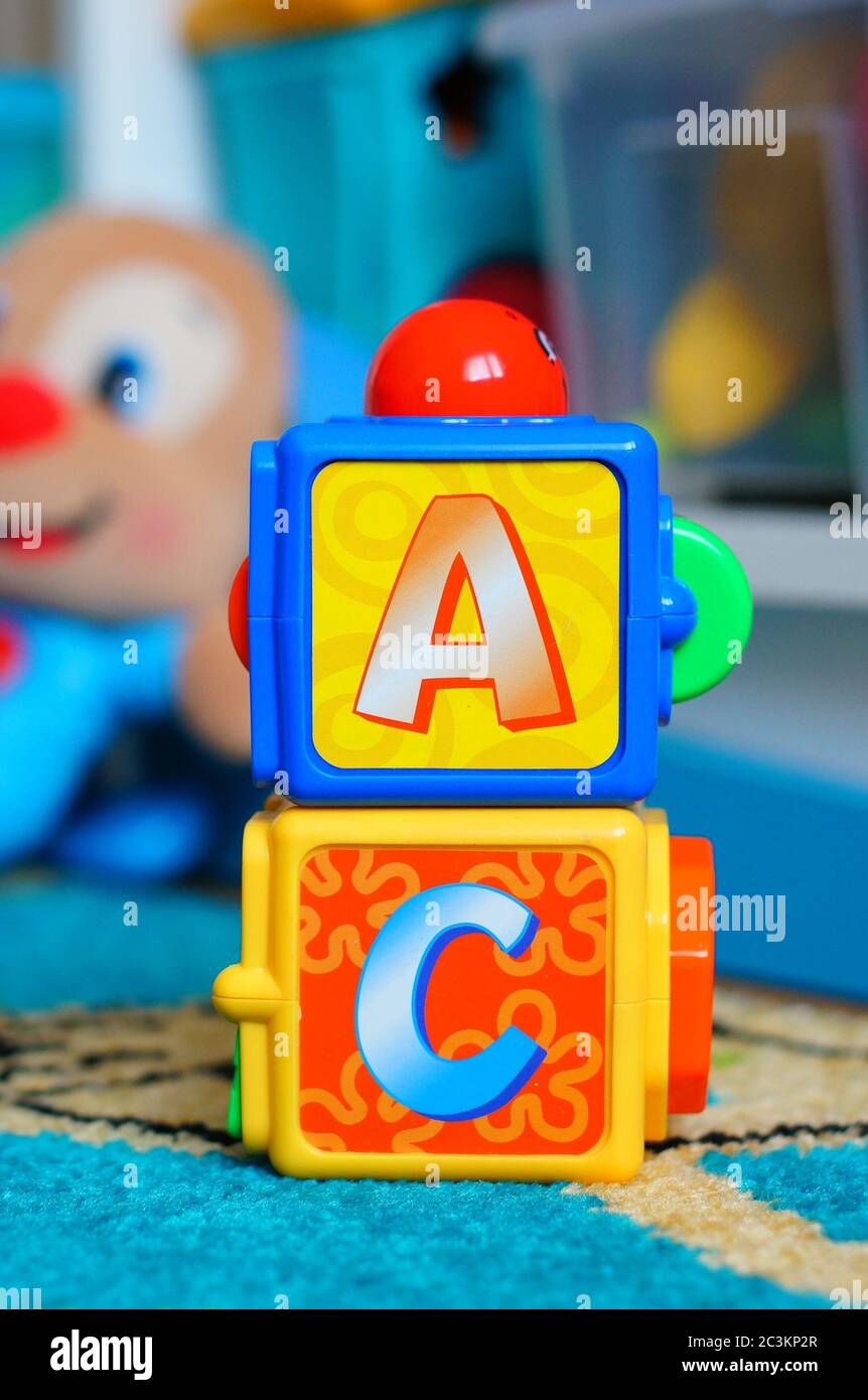 POZNAN, POLAND - Jul 28, 2016: Plastic Fisher Price stacked toy blocks with  letter A and C Stock Photo - Alamy