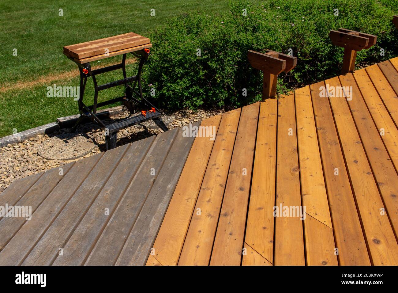 View of a cedar wood deck restoration with new floor boards Stock Photo
