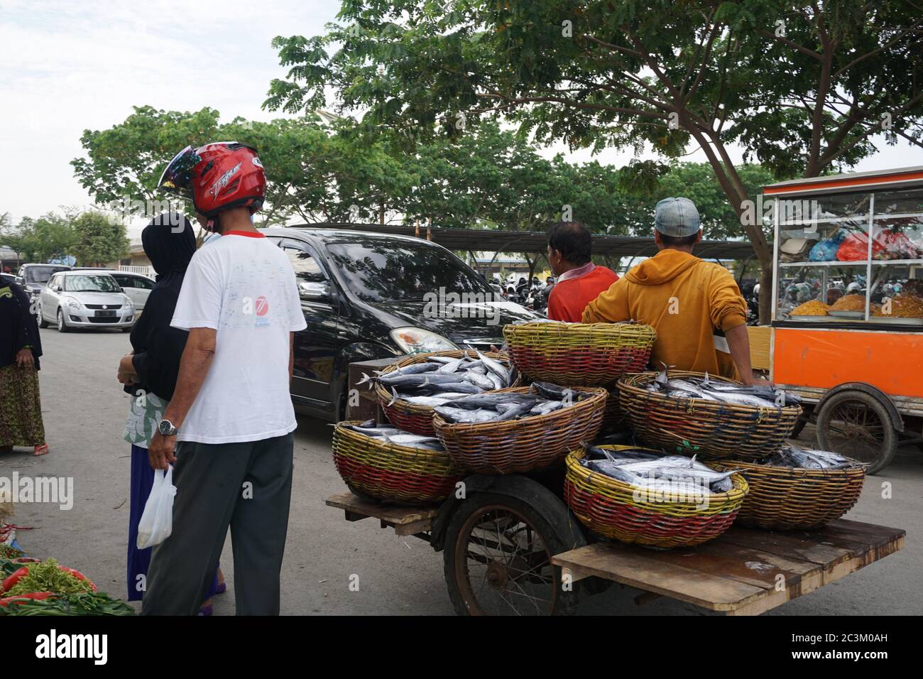 Local people selling and buying from a local market in Aceh Indonesia Stock Photo