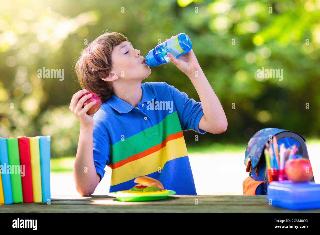 Child going back to school. Start of new school year after summer vacation. School lunch break