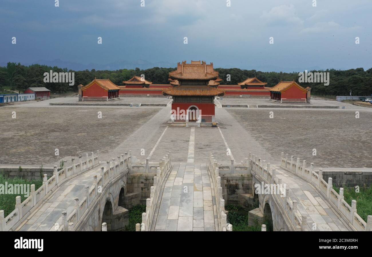 Yixian. 18th June, 2020. Aerial photo taken on June 18, 2020 shows a view of the western royal tombs of the Qing Dynasty (1644-1911) in Yixian County, north China's Hebei Province. The western royal tombs of the Qing Dynasty is the burial place of four emperors of the Qing Dynasty, namely Yong Zheng, Jia Qing, Dao Guang and Guang Xu. It was included into the World Heritage List in 2000. Credit: Zhu Xudong/Xinhua/Alamy Live News Stock Photo